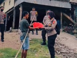 Sambut HUT RI ke‑80, Kapolsek Lamuru Bagikan 50 Bendera Merah Putih kepada Warga di Wilayah Terpencil
